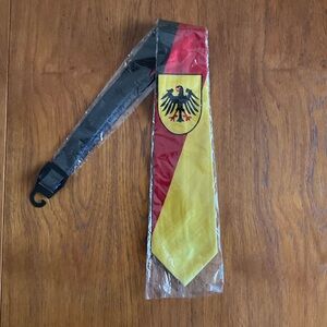 VIDA Red, Yellow, and Black Tie with Deutschland Emblem